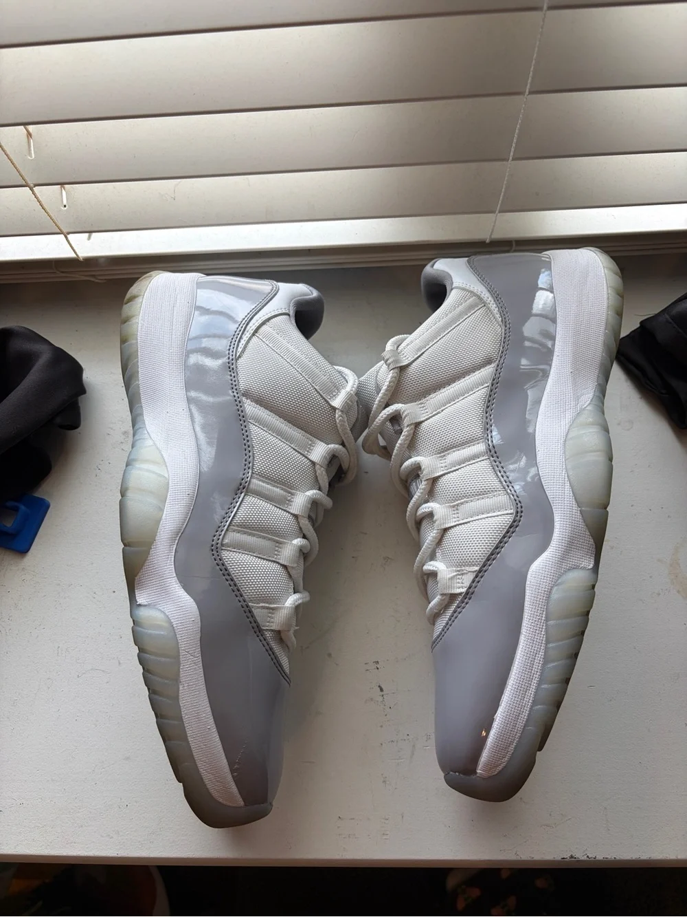 Jordan 11 low cement grey